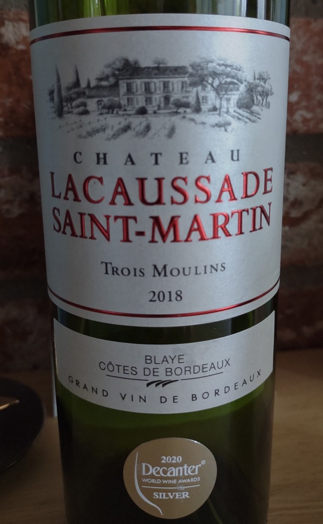Chateau Lacaussade Saint-Martin - Trois Moulins, 2018. The wine label is shown, and a second label announcing Silver medal at the 2020 Decanter World Wine Awards.  Grocery Outlet wine sale, Spring 2022 