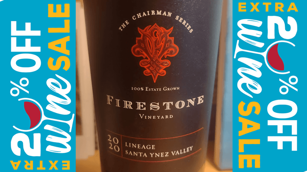 A bottle of wine is pictured - Firestone The Chairman Series Lineage 2020 red blend from the Santa Ynez Valley. On either side of the bottle are graphics announcing "Extra 20% off wine sale."