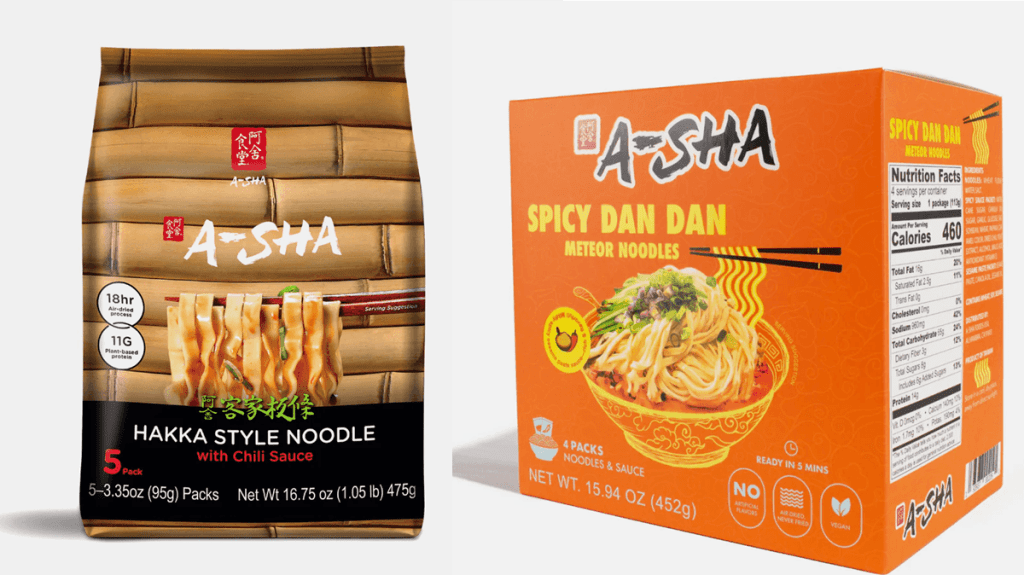 Two packaged A-Sha products are shown:  Hakka Style Noodles with Chili Sauce and Spicy Dan Dan Meteor Noodles.